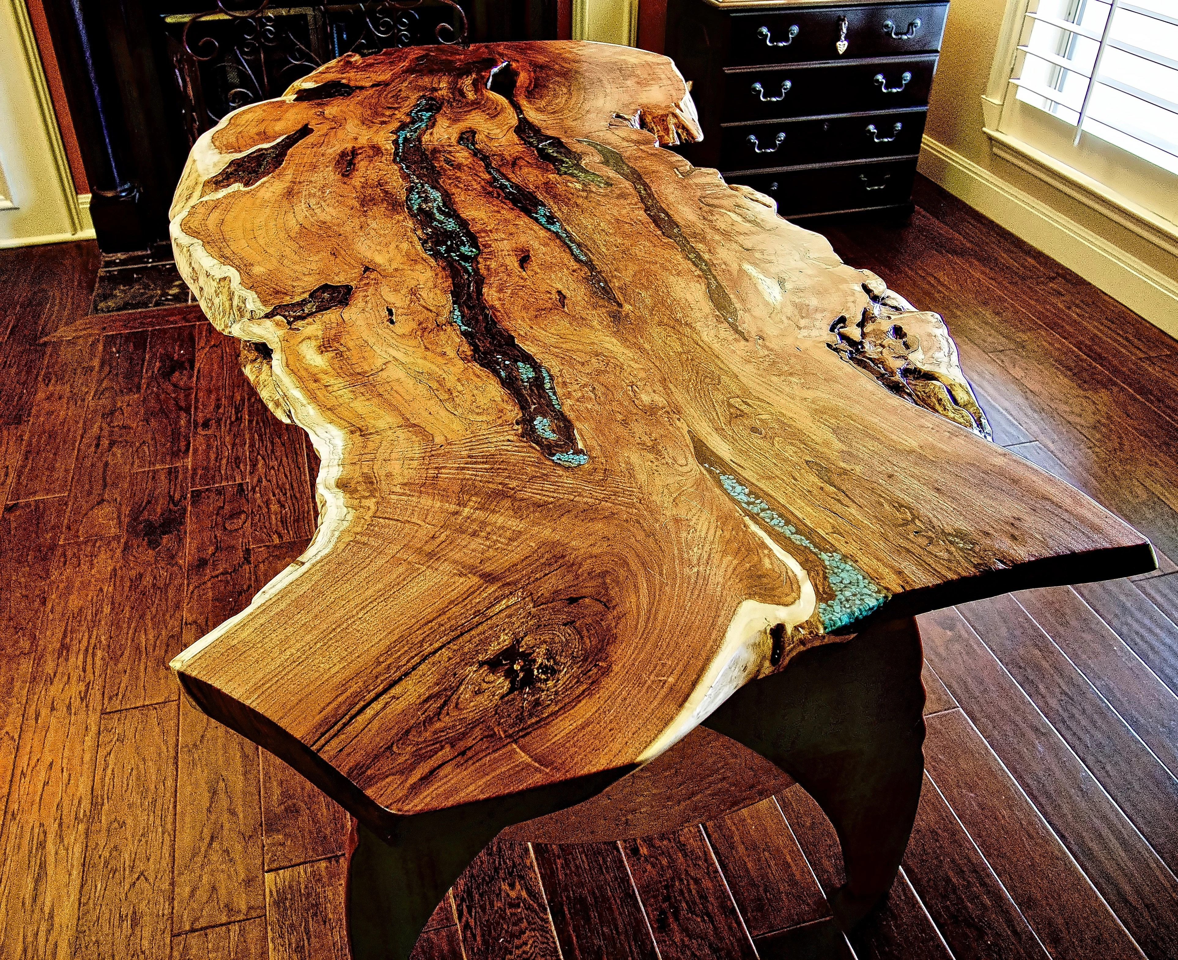 Live edge writing desk with mesquite top.